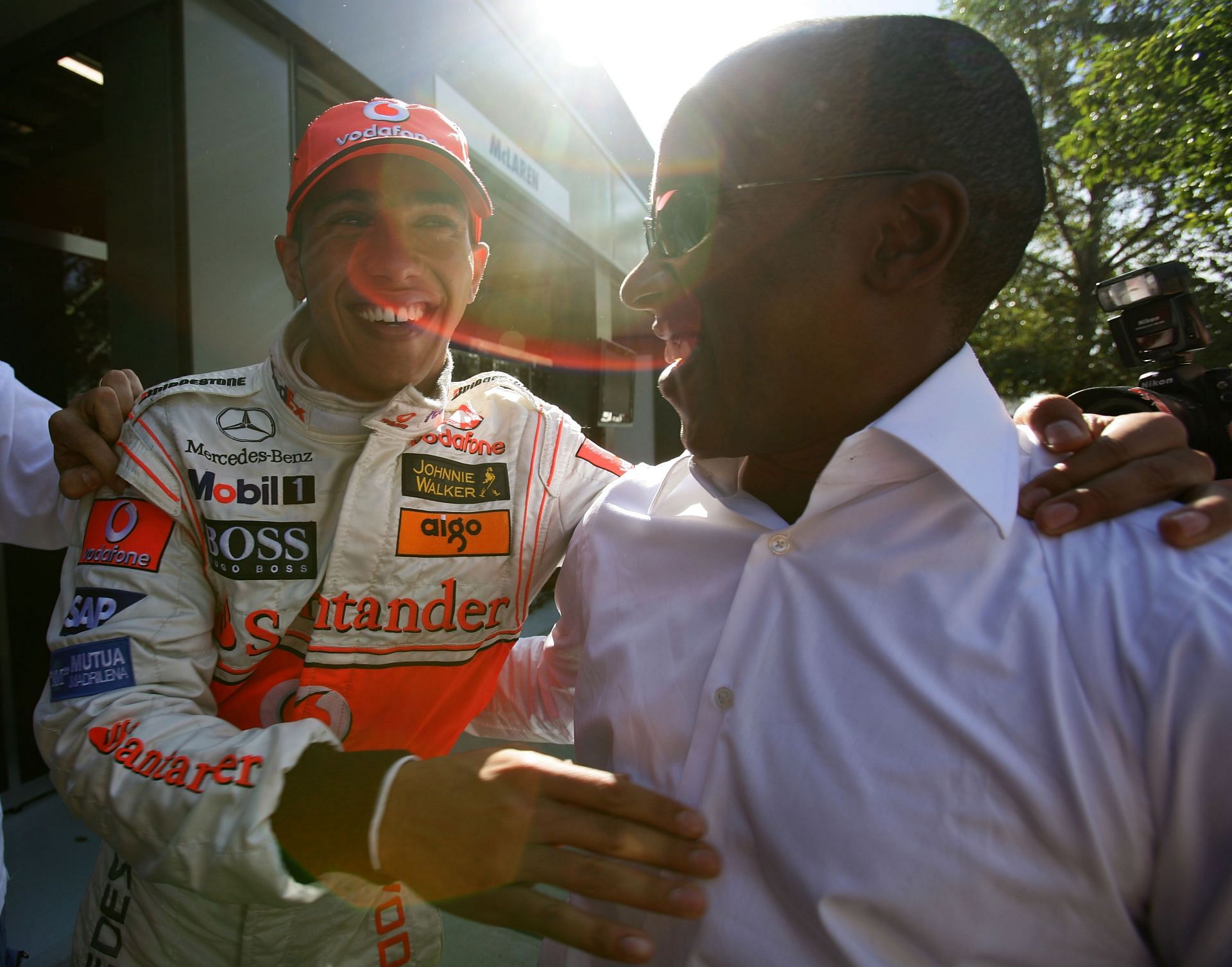 Lewis Hamilton and his father, Anthony Hamilton, after the 2007 Australian Grand Prix. Source: Getty
